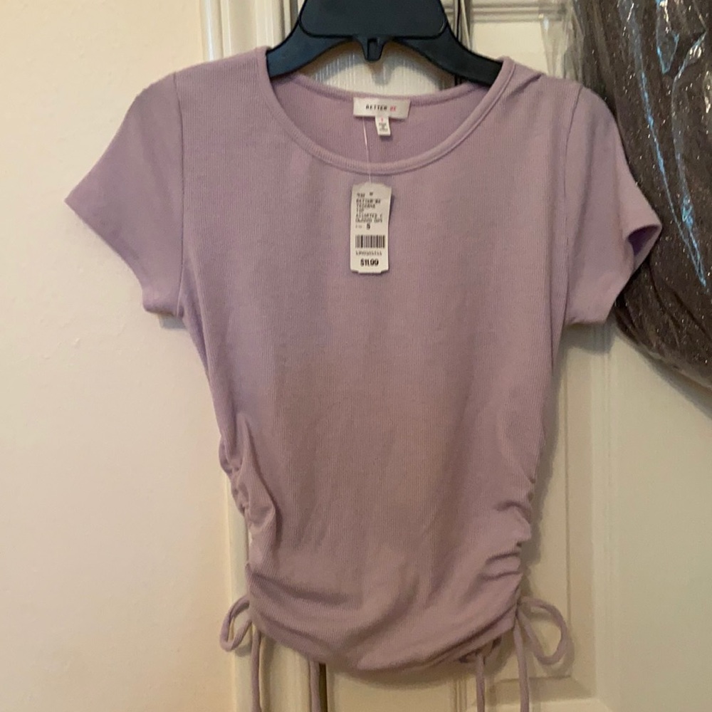 Purple shirt with ties on the side